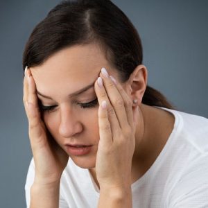 Woman suffering with vertigo Tasmanian Balance Clinic